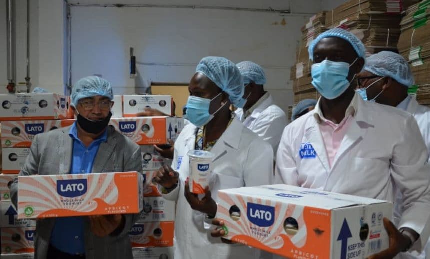 Lato officials at the factory's plant in Uganda. Image: BDA.