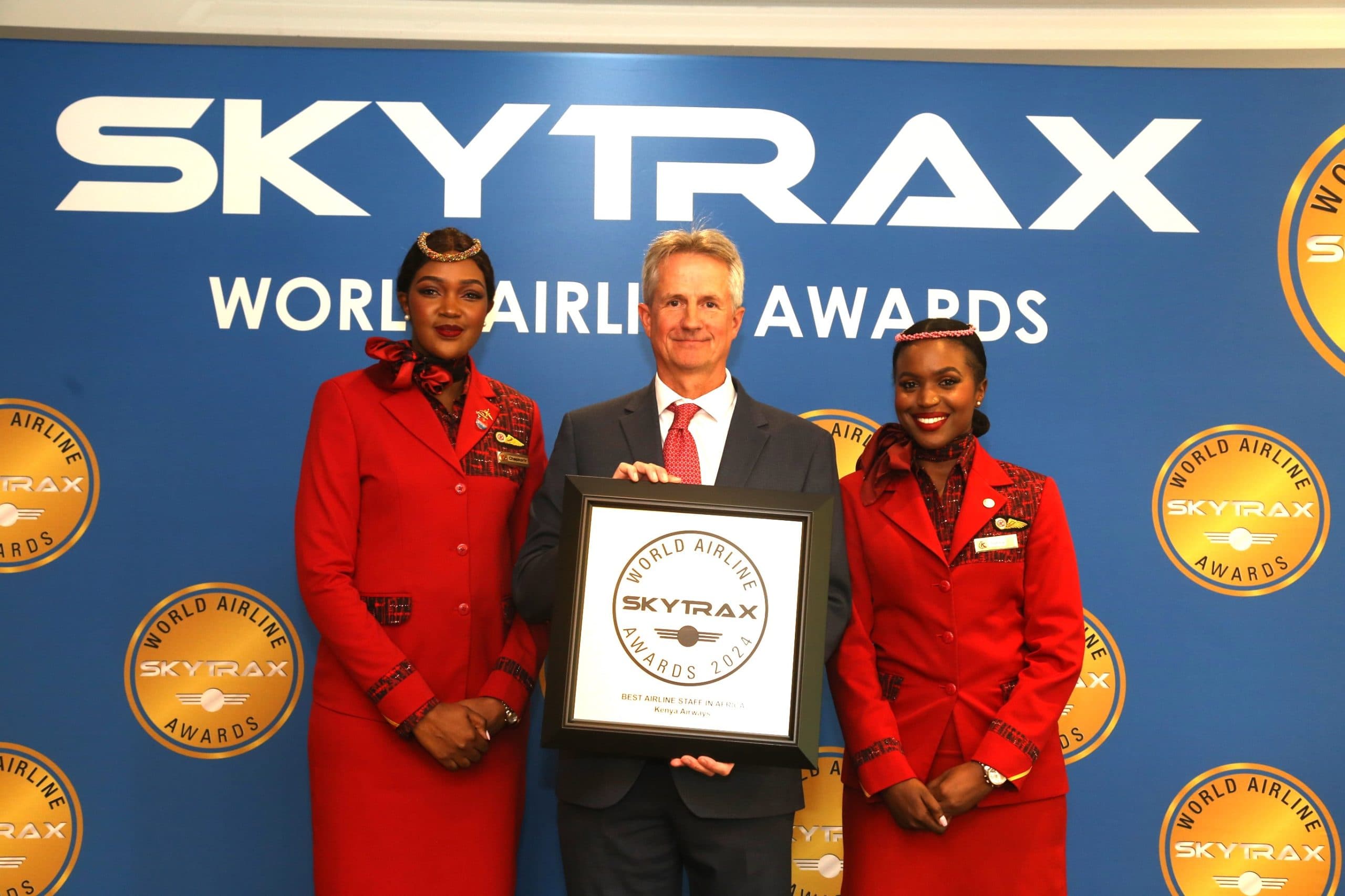 Kenya Airways Flight Attendant Beatrice Chepkorir, General Manager Sales Europe, Middle East, Greater India Asia, Americas and West Africa Tom Reeves, and Flight Attendant Francisa Kibulo posing with the award at the ceremony. Image: courtesy.